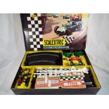 Scalextric - a twin car boxed motor racing set # 50 - Est £30 - £50