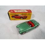 Tekno of Denmark - a rare Austin Healey 100 diecast model finished in green with original box,