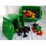 Two storage boxes containing a quantity of miscellaneous Lego bricks,