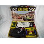 Scalextric - a boxed set, model motor racing twin-car set,