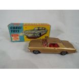 Corgi - a Buick Riviera # 245 in original box,