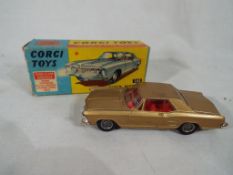 Corgi - a Buick Riviera # 245 in original box,