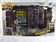 A boxed Official combat force play equipment set entitled Intelligence Base Electronic Light and