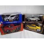 Burago / Maisto - four diecast models comprising Maisto 1:18 Lamborghini and Porsche,