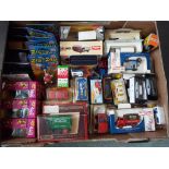 A collection of approximately 40+ diecast mint boxed / packaged model motor vehicles to include