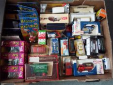 A collection of approximately 40+ diecast mint boxed / packaged model motor vehicles to include