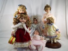 Six modern dressed collectable dolls,