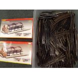 A large quantity of good OO gauge twin-rail track, straights, curves, points,