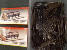 A large quantity of good OO gauge twin-rail track, straights, curves, points,