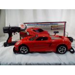 A radio controlled model Porsche Carrera GT ultimate performance vehicle,