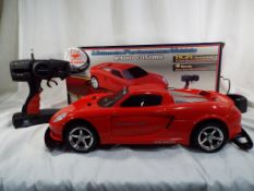 A radio controlled model Porsche Carrera GT ultimate performance vehicle,