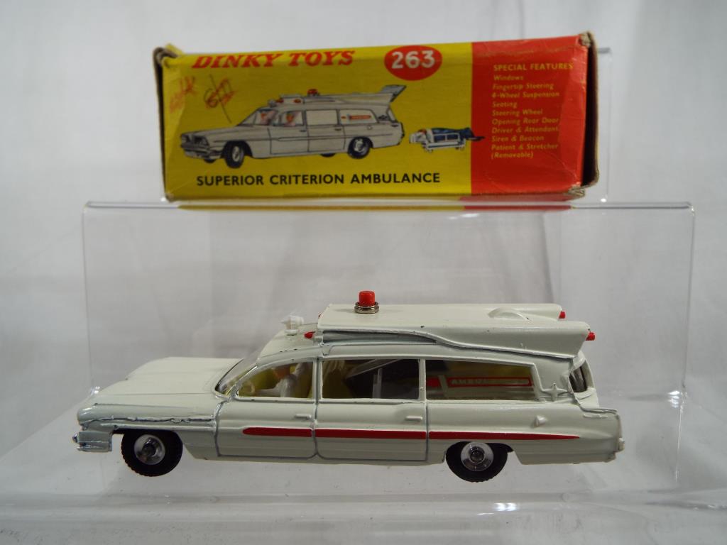 Dinky Toys - a Superior Criterion Ambulance with windows, fingertip steering, seating, suspension,