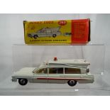Dinky Toys - a Superior Criterion Ambulance with windows, fingertip steering, seating, suspension,