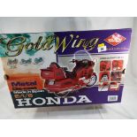 A metal diecast 1:6 scale model of a Honda Gold Wing 1.