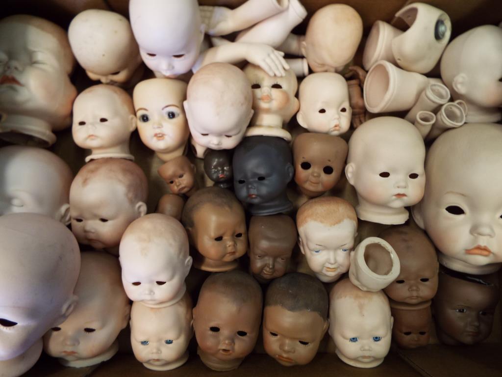 Dolls - a quantity of modern heads,