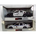 UT Models - two 1:18 scale diecast models, North American police cars, Canada and Glendale,