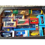 A collection of approximately 18 diecast model motor vehicles to include five Corgi Steam Roller