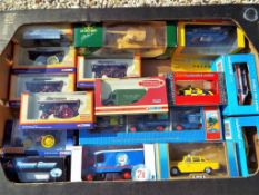 A collection of approximately 18 diecast model motor vehicles to include five Corgi Steam Roller