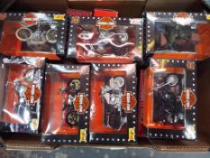 Maisto - a collection of approximately 21 diecast 1:18 scale model motorcycles to include many