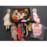 A good lot to include over 10 vintage dolls and dolls clothes and 1 doll marked E W Byron to the