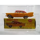 Dinky Toys - Plymouth USA Taxi, yellow/red body, yellow interior, white treaded tyres, spun hubs,