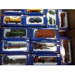 A collection of 27 1:76 scale / OO scale diecast models of commercial motor vehicles by Base Toys,