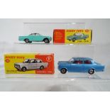 Dinky Toys - # 136 Vauxhall Viva, blue body with red fitted interior and windows,