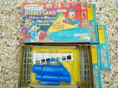 Chad Valley - Disney Land 'Give-a-Show' battery operated Projector with 112 colour slides in