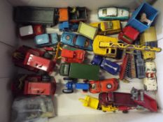 Dinky / Corgi - a collection of approximately 28 playworn 1940s to 1960s diecast models to include
