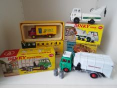 Dinky Toys - Refuse Wagon with fore and aft tipping actions and two dustbins # 978,