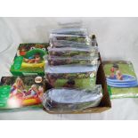 Unused retail stock - a collection of ten paddling pools all in original packaging