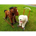 A child's sit-on rocking horse and a push-along dog