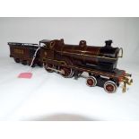 Model Railways O Gauge - a tin plate clockwork locomotive and tender, op no 5320, maroon livery,