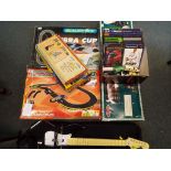 A good lot to include two Scalextric sets both boxed, a telescope and tripod,