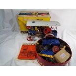 A good lot to include a Wilesco model steam roller and a quantity of vintage Meccano