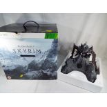 The Elder Scrolls V Skyrim Collectors Edition, with related ephemera and original box.