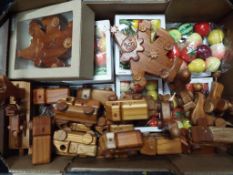 A good mixed lot to include eleven wooden pocket pets, two wooden clowns with hidden drawers,