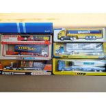 A collection of Corgi Container Trucks comprising #1107 US Lines, #1109 Aral, # 3400H Hershey's,