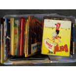 Approximately 40 children's annuals to include Snoopy, Dandy, Topper, Tom and Jerry,