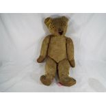 A rare Chad Valley brown mohair Aerolite Teddy Bear with orange and black glass eyes, straw filled,