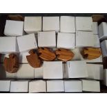 Unused retail stock - approximately 50 carved wooden trinket boxes in the form of fish