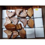 A good mixed lot of approximately 56 carved wooden trinket boxes to include penguins, shells,