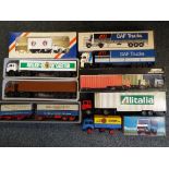 A collection of diecast tractor / trailer units and similar,