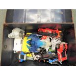 A metal trunk approximately 51 cm x 36 cm x 36 cm containing a quantity of toys to include Batman,
