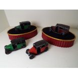 Dinky Toys - four model Taxis of which two x green and black,