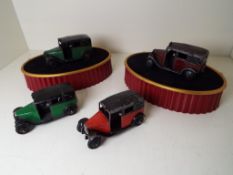 Dinky Toys - four model Taxis of which two x green and black,