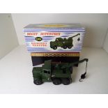 Dinky Supertoys - a Recovery Tractor # 661 military green body and hubs, crane fully functional,