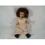 Dolls - a bisque headed Armand Marseille doll dressed doll with jointed limbs,