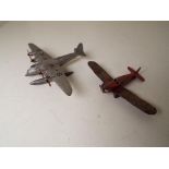 Dinky Toys - a Seaplane G-AVKW, cast silver body with four twin-blade red propellers,