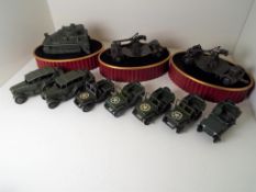 Dinky Toys - five Jeeps of which four with US decals # 153a, two Personnel Carriers,